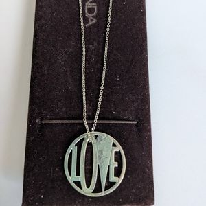 New Sterling silver love pendant.New.  16 1/2 in. Italian designer Piaegona.